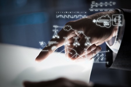 Close up of businessman hand touching tablet screenの写真素材