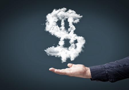 Conceptual image with cloud dollar sign on palmの写真素材