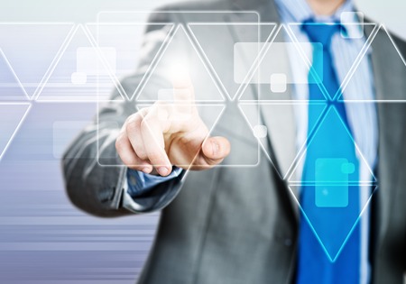 Close up of businessman hand touching icon of media screenの写真素材
