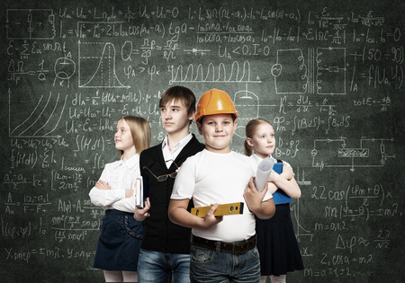 Children of school age trying different professionsの写真素材