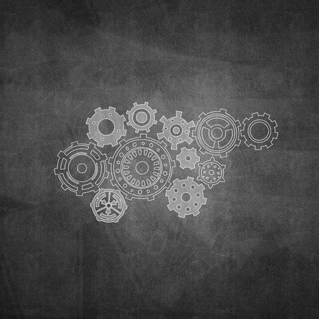 Background image with cogwheels on cement wallの写真素材