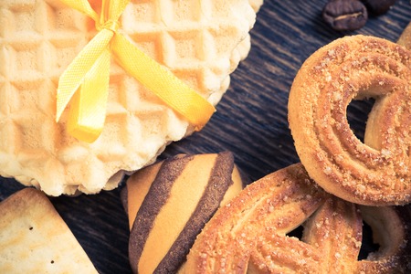 Cookies and biscuits for celebration on wooden table