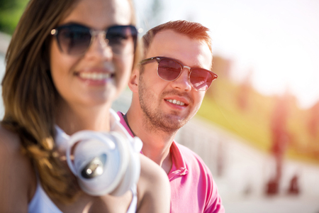 Young happy smiling couple having date outdoorsの写真素材