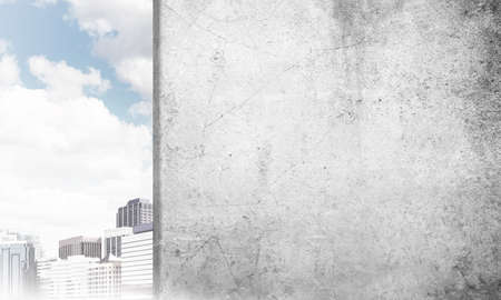 Cement blank banner wall and city on horizon. Place your textの写真素材