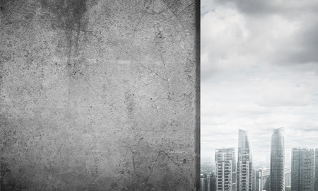 Cement blank banner wall and city on horizon. Place your textの写真素材