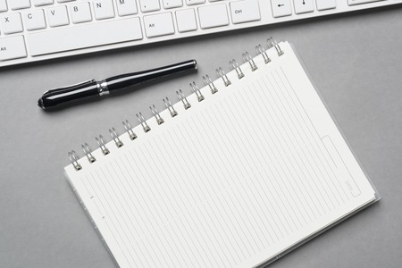 Concept of business still life with office objects on gray surfaceの写真素材