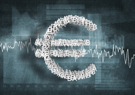 Big euro currency symbol on graphs and diagrams backgroundの写真素材