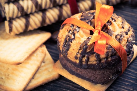 Cookies and biscuits for celebration on wooden tableの写真素材