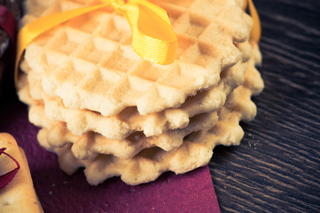 Cookies and biscuits for celebration on wooden tableの写真素材
