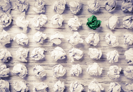 Set of crumpled paper balls with one colorfulの写真素材