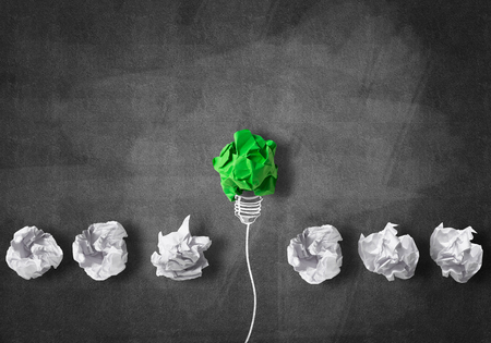 Inspiration concept with crumpled paper light bulb as good ideaの写真素材