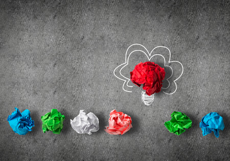 Inspiration concept with crumpled paper light bulb as good idea