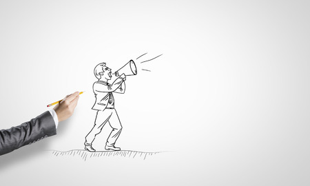 Drawn businessman on white background screaming in megaphoneの写真素材