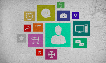 Group of colorful application icons on wall backgroundの写真素材