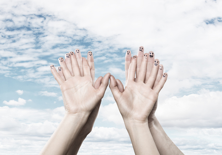 Hands of man and woman representing love and happinessの写真素材