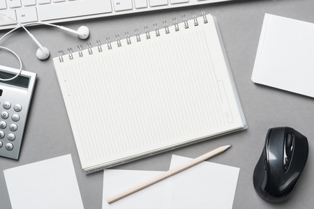 Concept of business still life with office objects on gray surfaceの写真素材