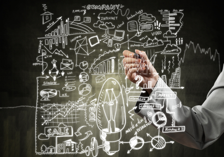 Close view of businesswoman drawing strategy plan on screenの写真素材