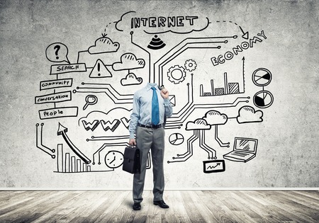 Headless engineer man with papers in hand against sketched backgroundの写真素材