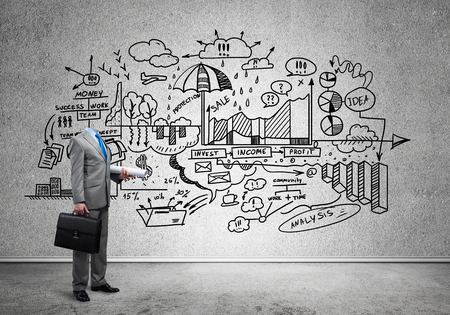 Headless engineer man with papers in hand against sketched backgroundの写真素材