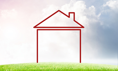 House figure as real estate symbol on clouds backgroundの写真素材