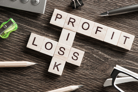 Words of business marketing collected in crossword with wooden cubesの写真素材