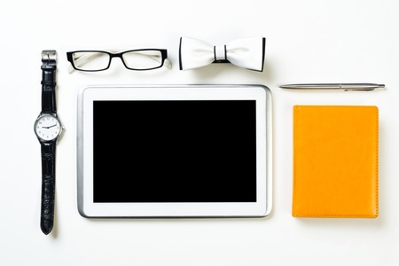 Men's accessories and tablet on white wooden surfaceの写真素材