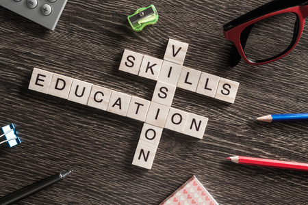 Words of business marketing collected in crossword with wooden cubes
