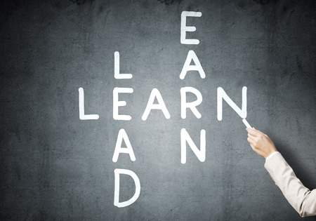 Studying concept with crossword drawn on blackboardの写真素材