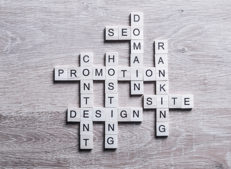 Conceptual business keywords on table with elements of game makiの写真素材