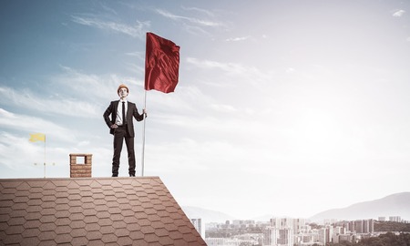 Young businessman with flag presenting concept of leadership. Miの写真素材