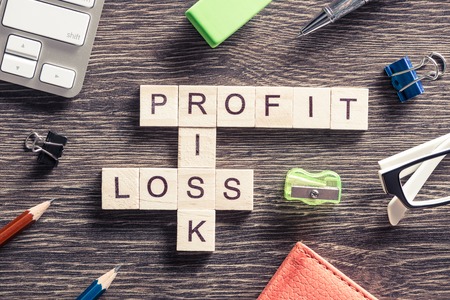 Conceptual business keywords on table with elements of game making crosswordの写真素材