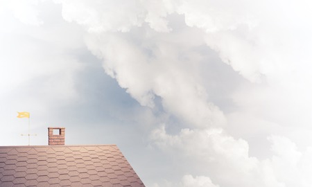 House roof as concept of suburbian real estate and construction.の写真素材