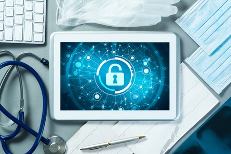 Web security and technology concept with tablet pc on tableの写真素材