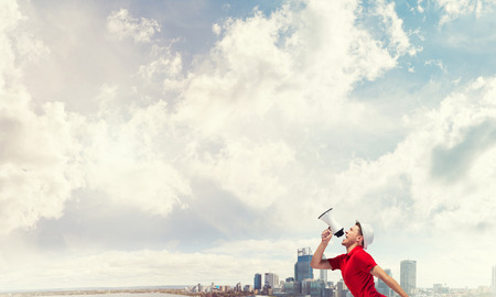 Guy screaming in loudspeakerの写真素材