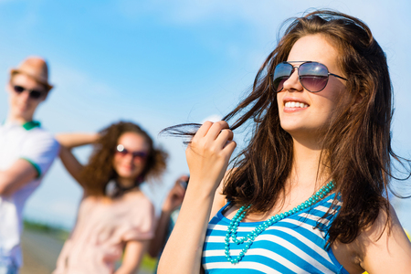 stylish young woman in sunglassesの写真素材