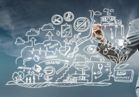 Close view of businesswoman drawing ecology concept on screenの写真素材