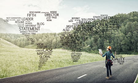 Female construction worker on road and globalisation conceptの写真素材