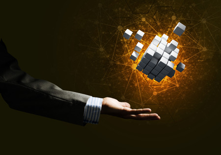 Close of businessman hand holding cube figure as symbol of innovation. 3D renderingの写真素材