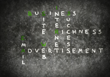 Studying concept with crossword drawn on blackboardの写真素材