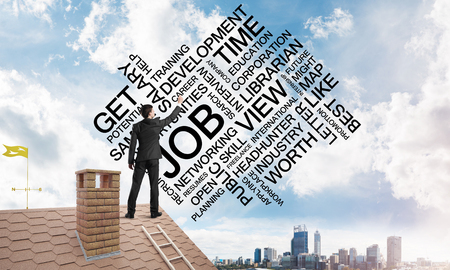 Businessman writing business related and success conceptual words. Mixed mediaの写真素材