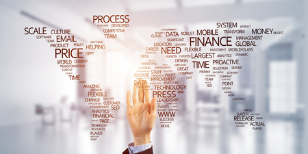 Close of businesswoman hand touching global business concept on screenの写真素材