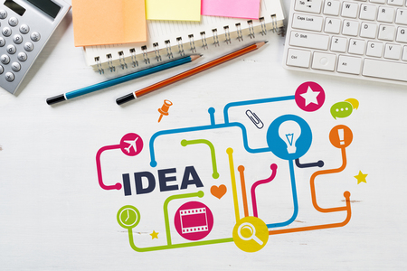 Business workplace with devices and stationary stuff presenting still life conceptの写真素材