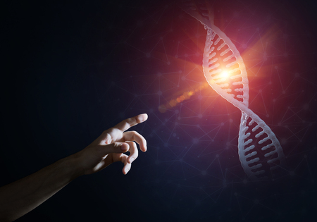 Close of man hand presenting DNA molecule research as concept. Mixed mediaの写真素材