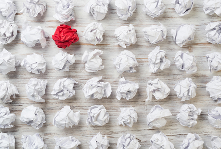 Set of crumpled paper balls with one colorfulの写真素材