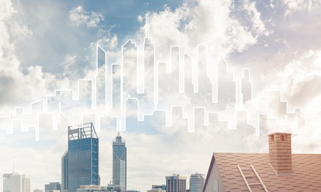 Brick house roof and modern cityscape at backgroundの写真素材