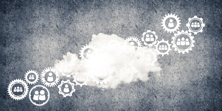 Background image with gears and cloud computing connection concept on concrete wallの写真素材