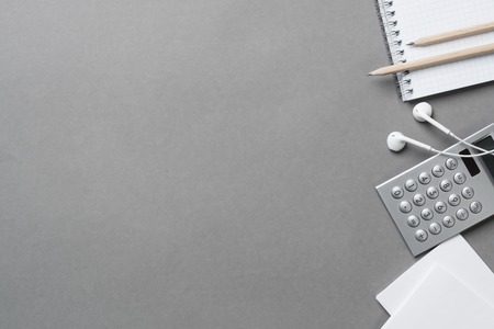 Concept of business still life with office objects on gray surfaceの写真素材