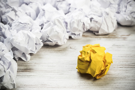 Set of crumpled paper balls with one colorfulの写真素材