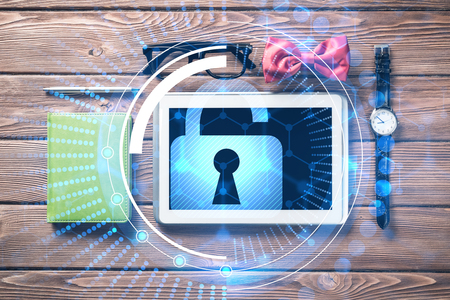 Mens accessories and tablet with security concept on screenの写真素材