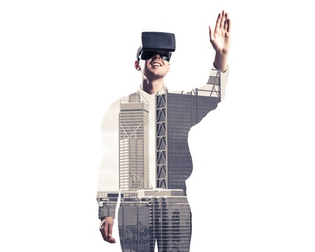 Young man with virtual reality headset or 3d glasses over cityscape background